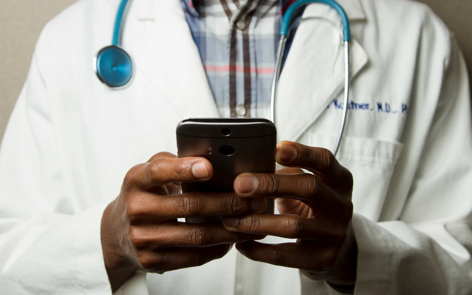 Healthcare professional using a mobile device
