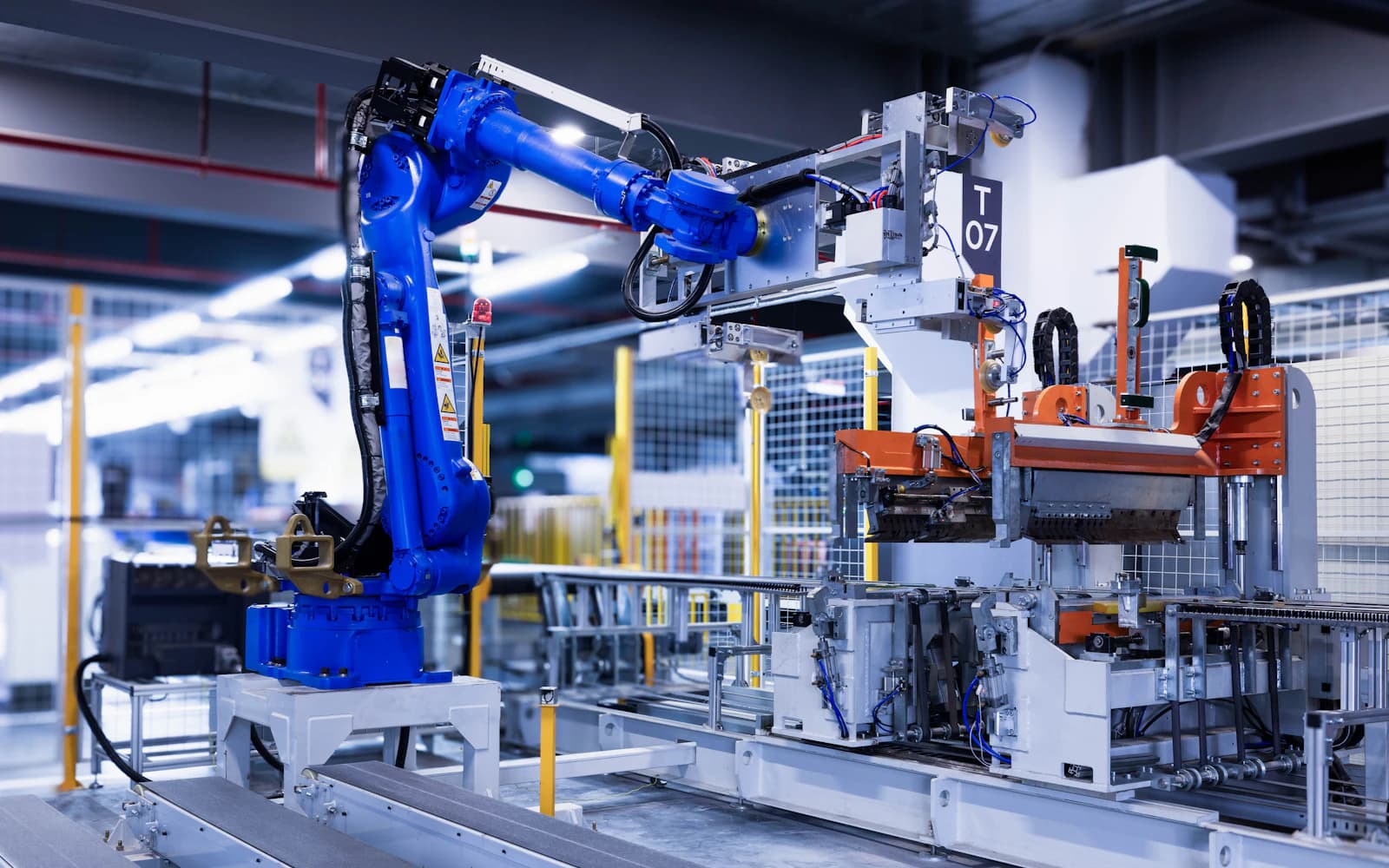 Industrial robotic arm operating on an automated production line